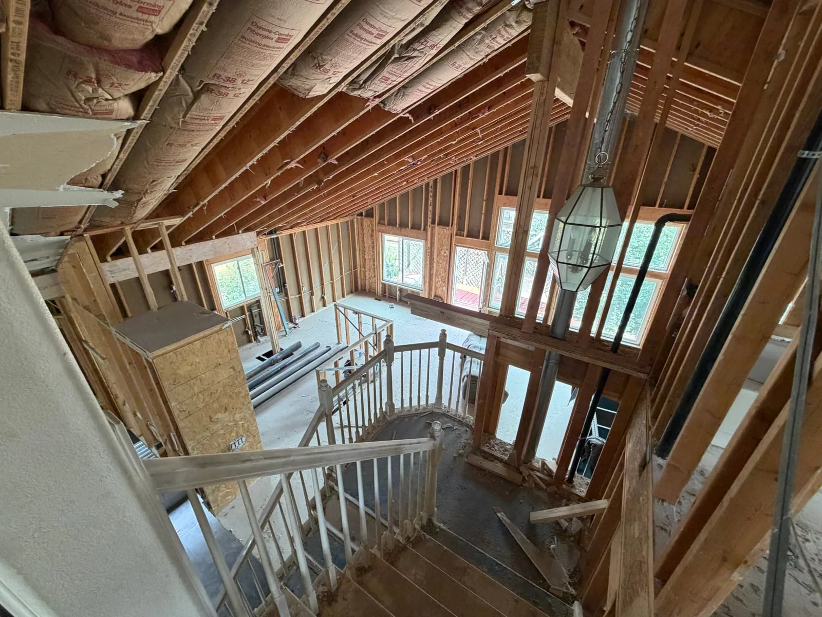 Stair tower and two-story window wall framing during a Highlands Ranch fire restoration