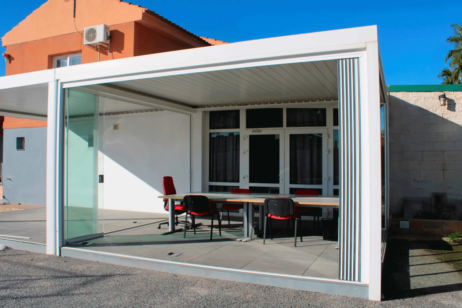 Frameless sliding glass office enclosure — After