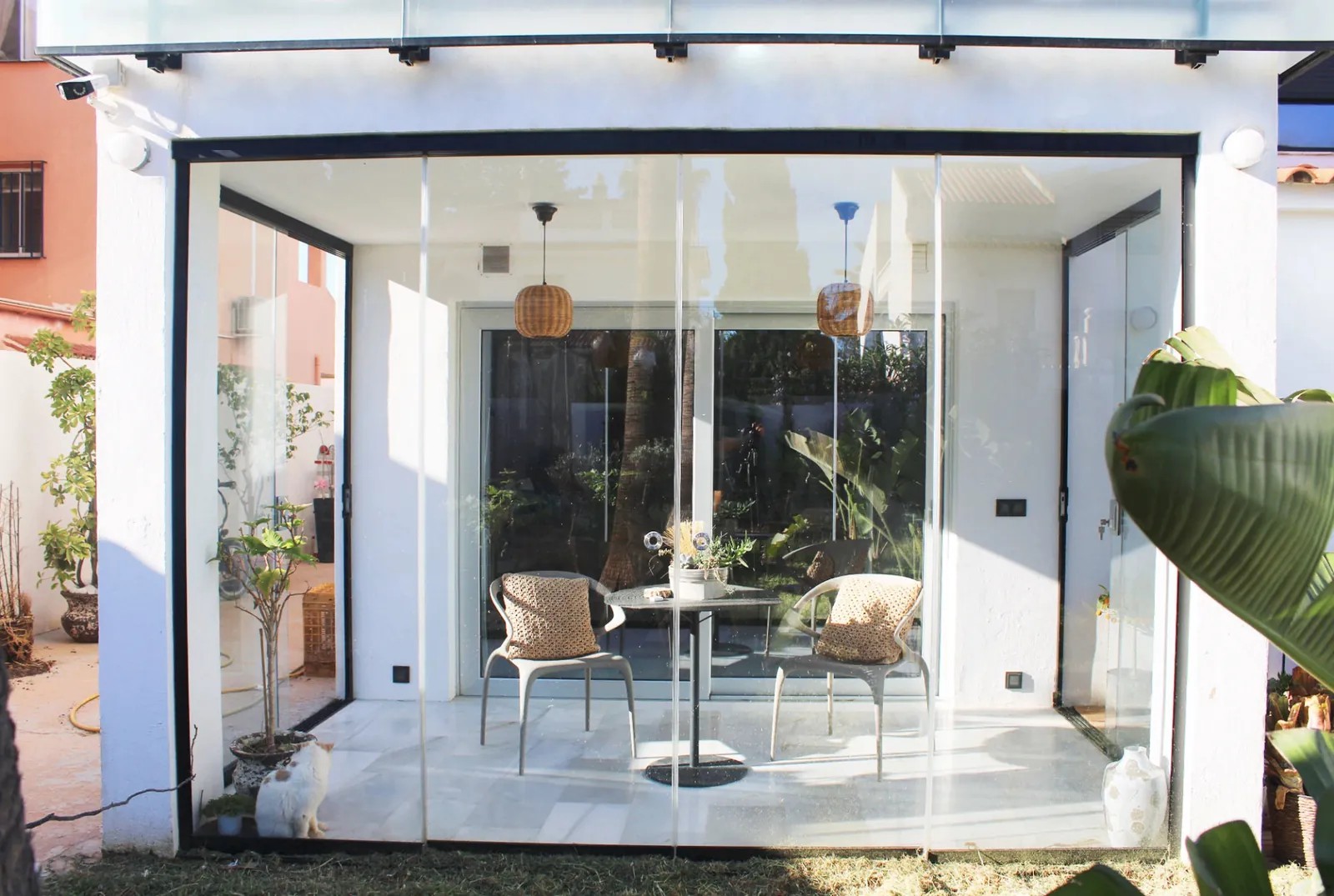 Frameless glass patio enclosure — Before