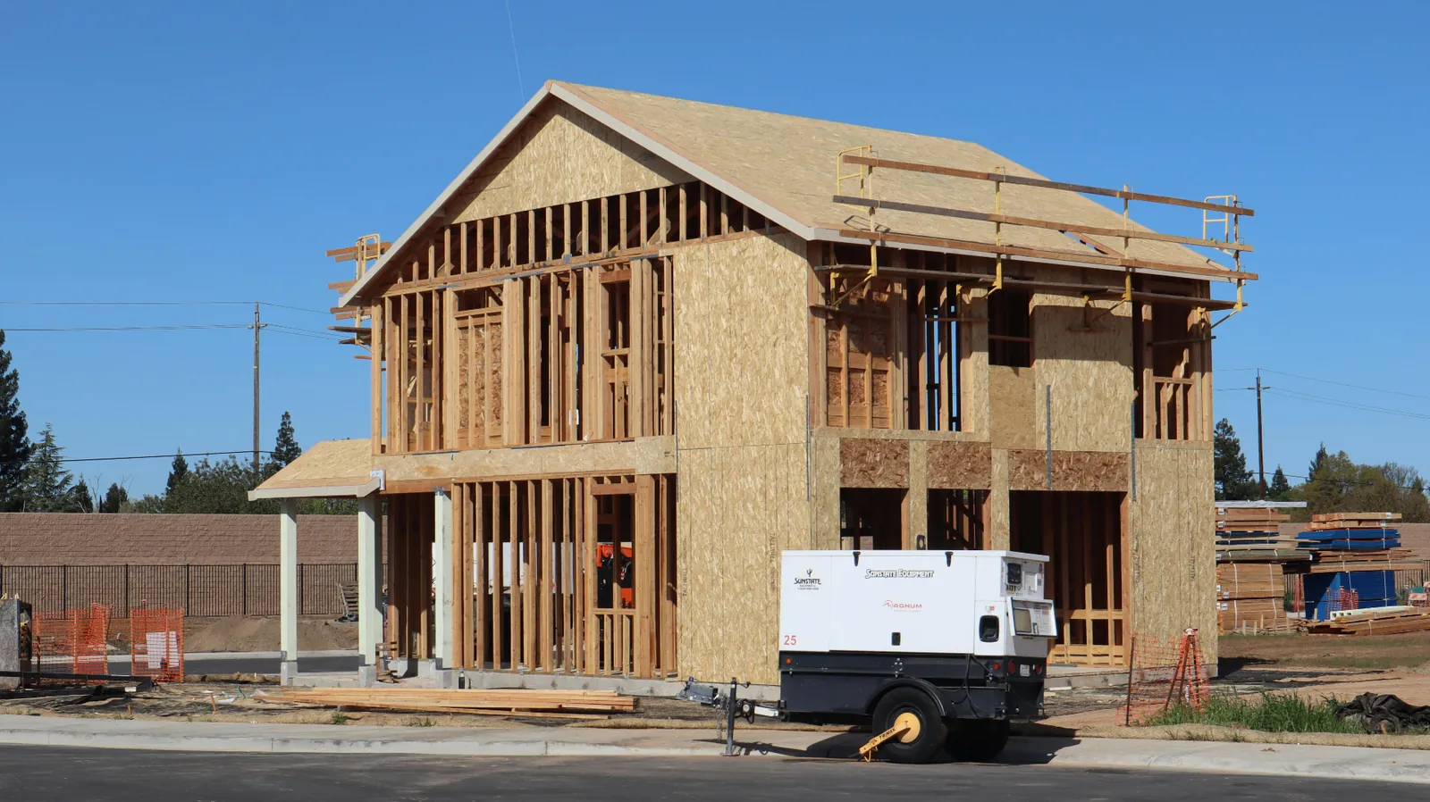 New home addition framed and tied into an existing Colorado house